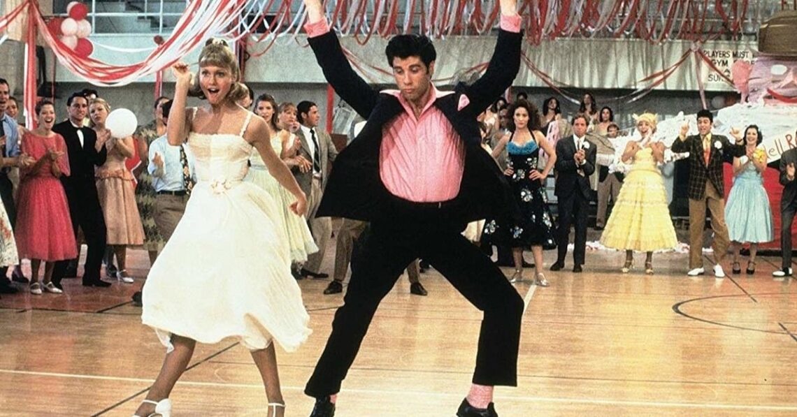 Still from the movie musical 'Grease' with Sandy and Zuko dancing (Photo by Paramount Pictures)