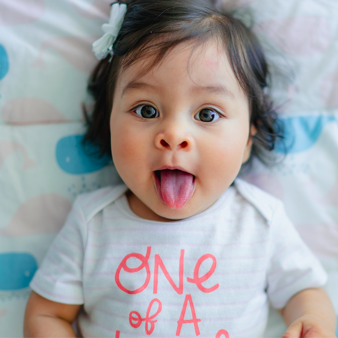 Baby sticking out tongue