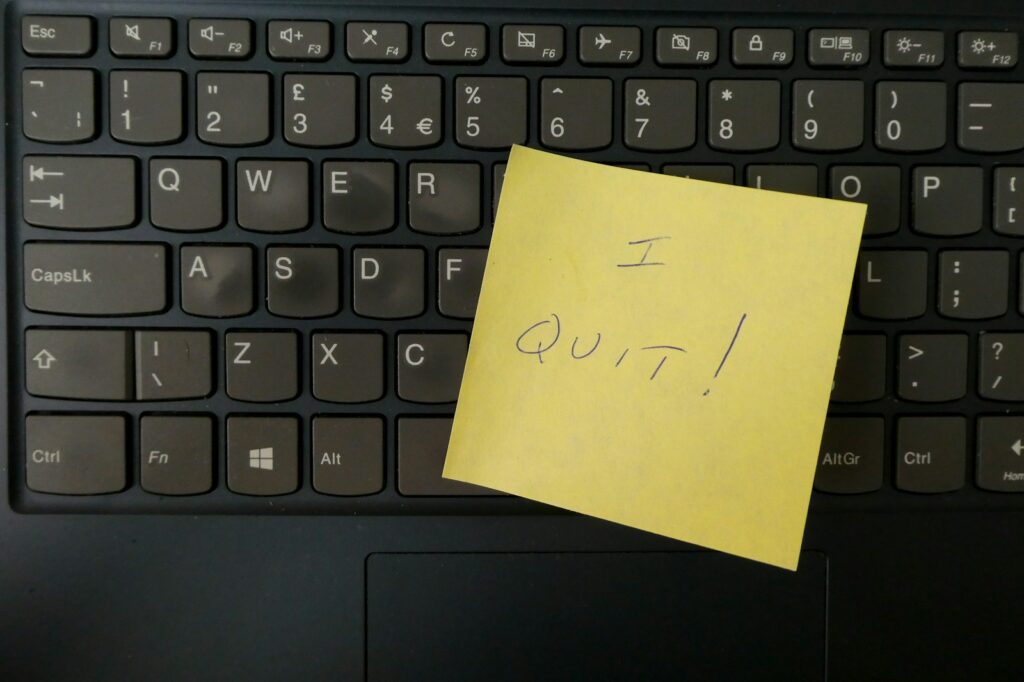 a yellow notepad that reads 