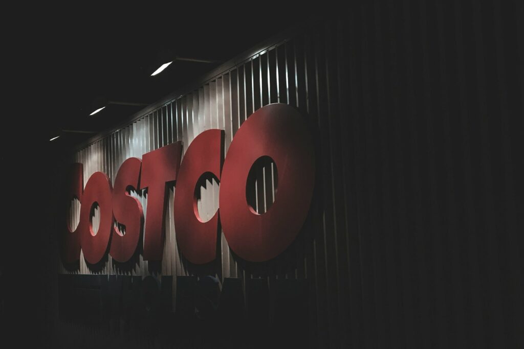 Costco signage in low lighting.