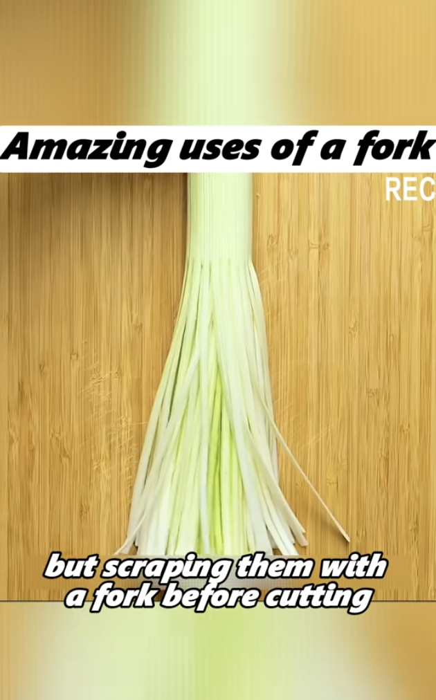 cutting green onions using a fork