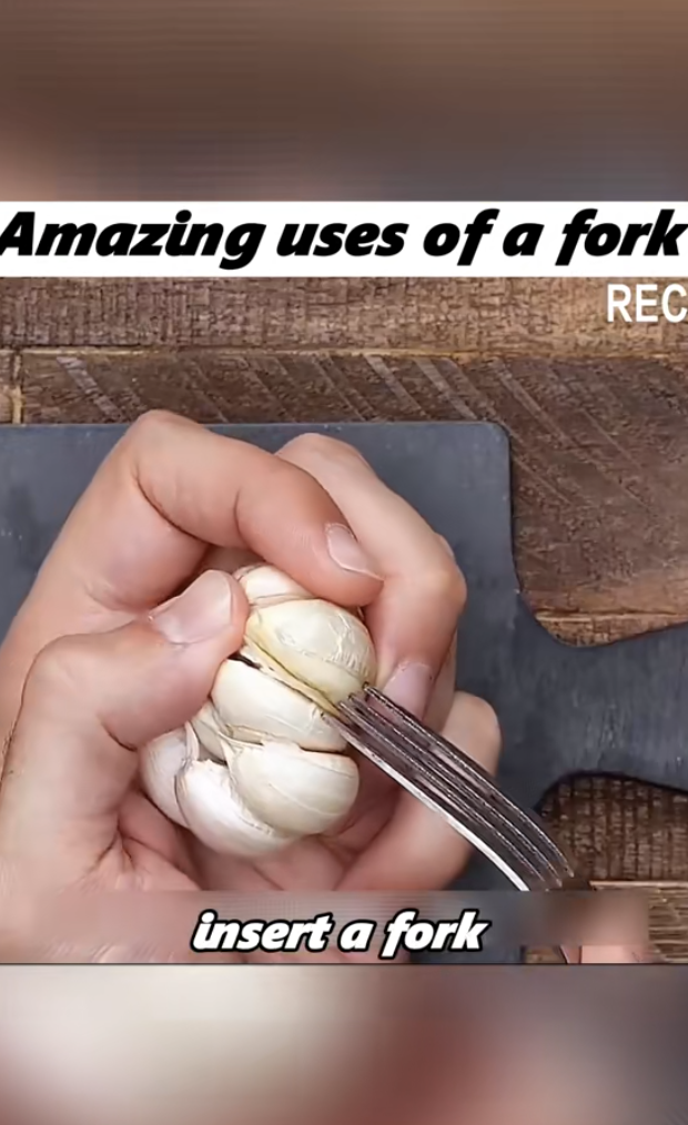 peeling garlic using a fork
