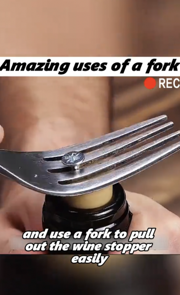 opening a bottle of wine using a fork