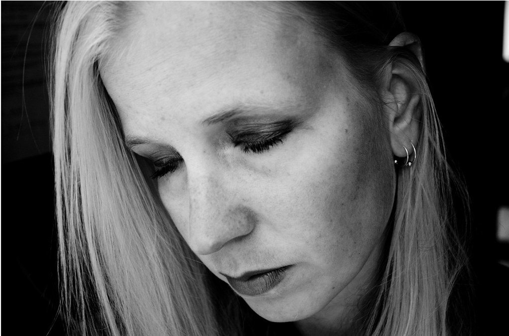 Sad woman looking down