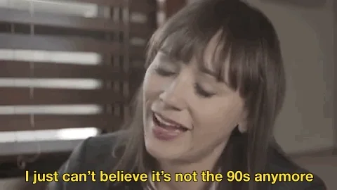 A gif of a woman with dark hair saying 