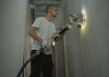 man renovating a house