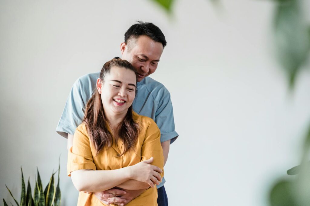 A Couple Hugging Each Other