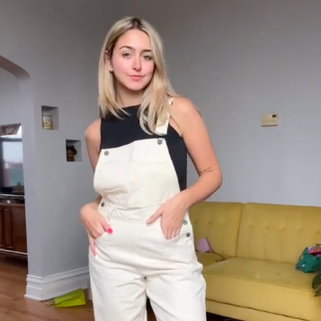 Woman in overalls