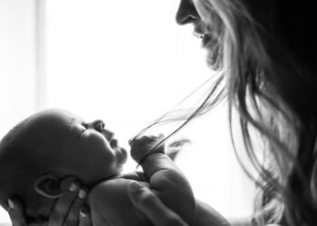 mom holding newborn baby