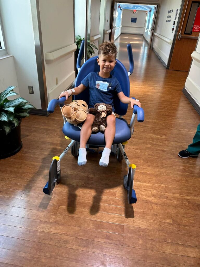 child in a wheelchair at the hospital