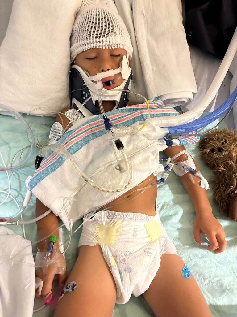 child in hospital attached to tubes