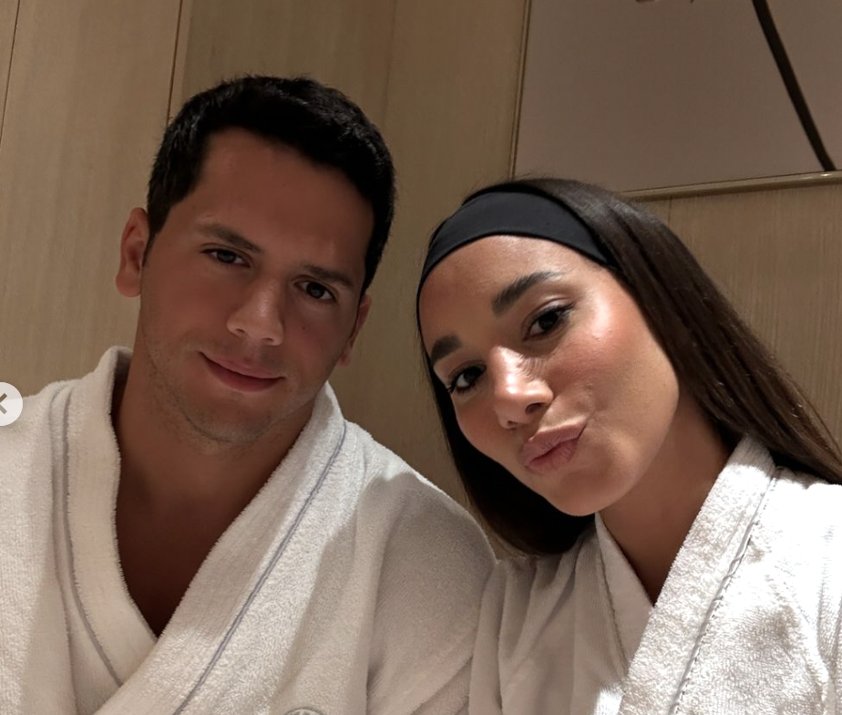 influencer couple in spa bathrobes 