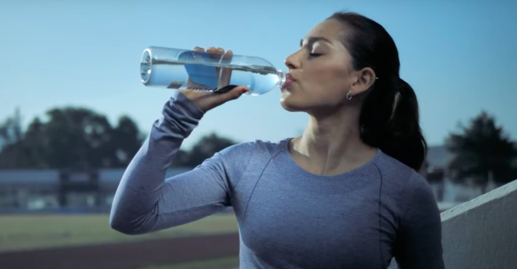 Woman drinking water stock footage via YouTube