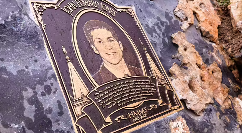 A plaque of John Jones outside nutty putty cave