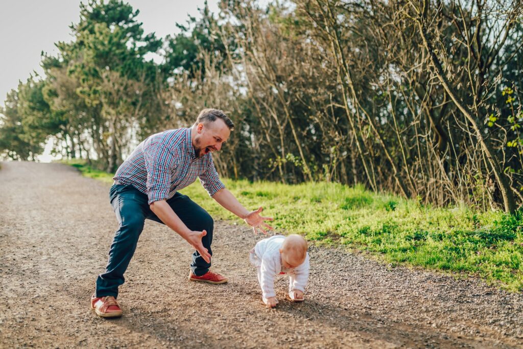 man taking child