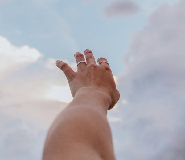 hand reaching to the sky