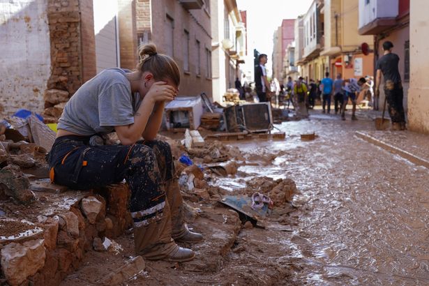 Residents grapple with the aftermath as flood cleanup efforts continue.