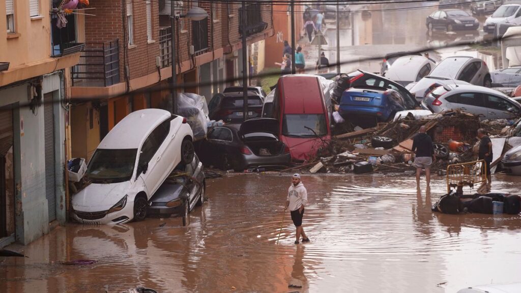 Rescue workers in Spain are searching for bodies following floods that claimed over 200 lives.