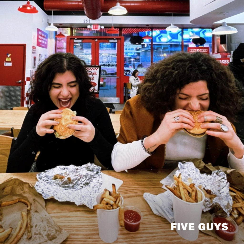 Five Guys customers eating.