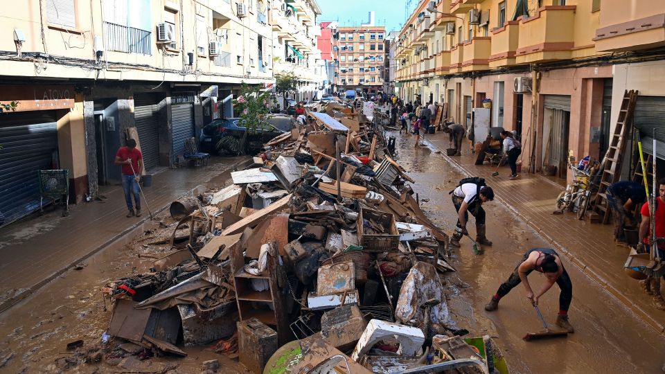 Debris lines the street in Paiporta, Valencia, following the devastating floods.