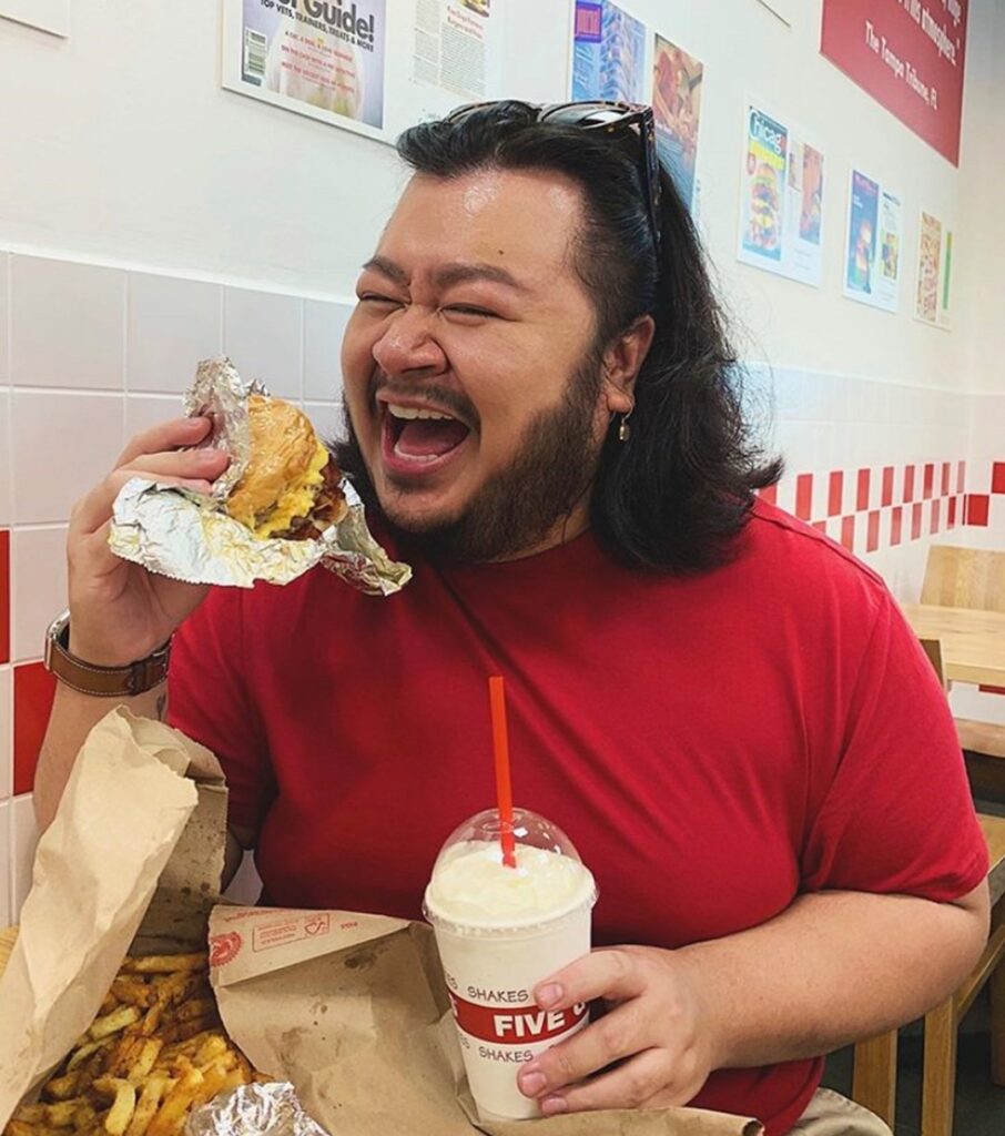 Five Guys happy customer.