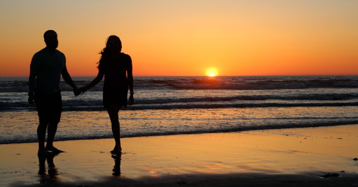 Couple at the beach (Photo by Nickay3111 via Flickr)