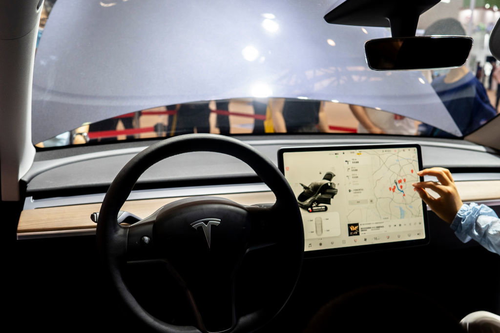 Screen in a Tesla's driver's cab, showing the smart and...