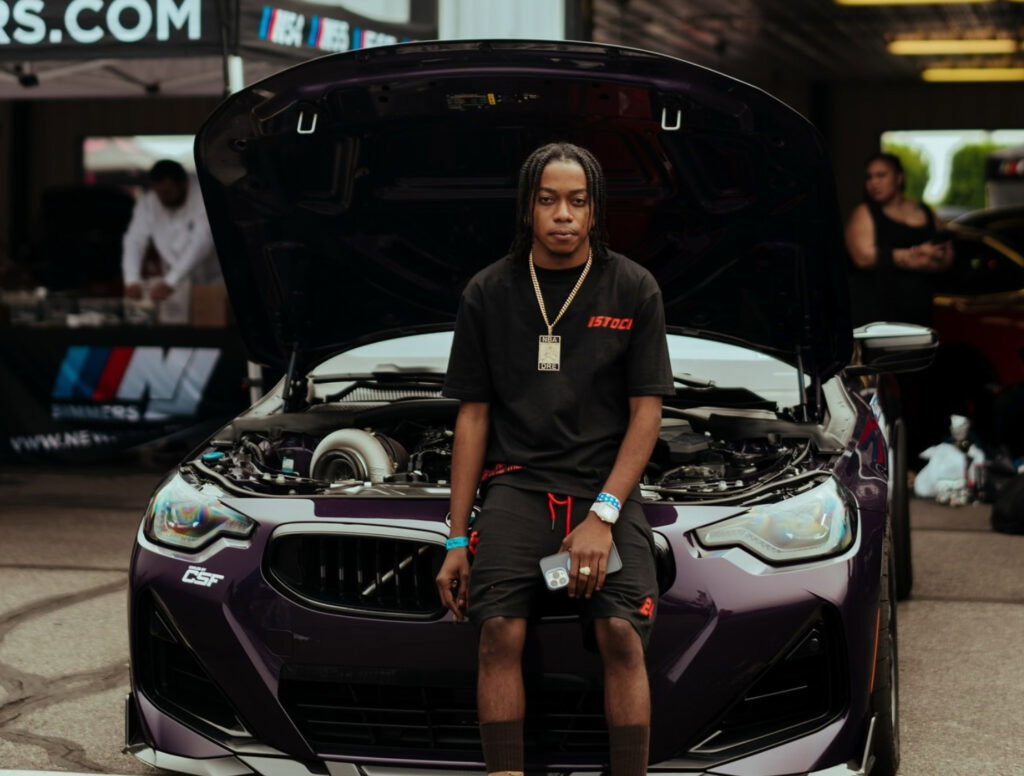 youtuber andre beadle with his bmw