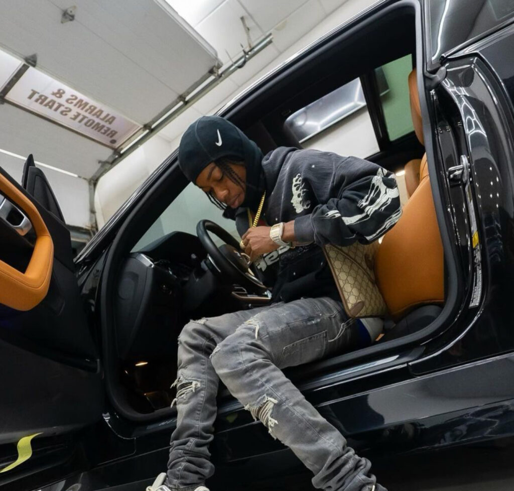 youtuber andre beadle getting out of a car