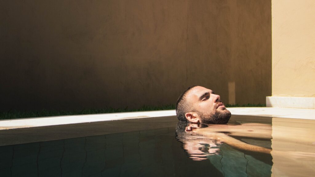 man floating in water