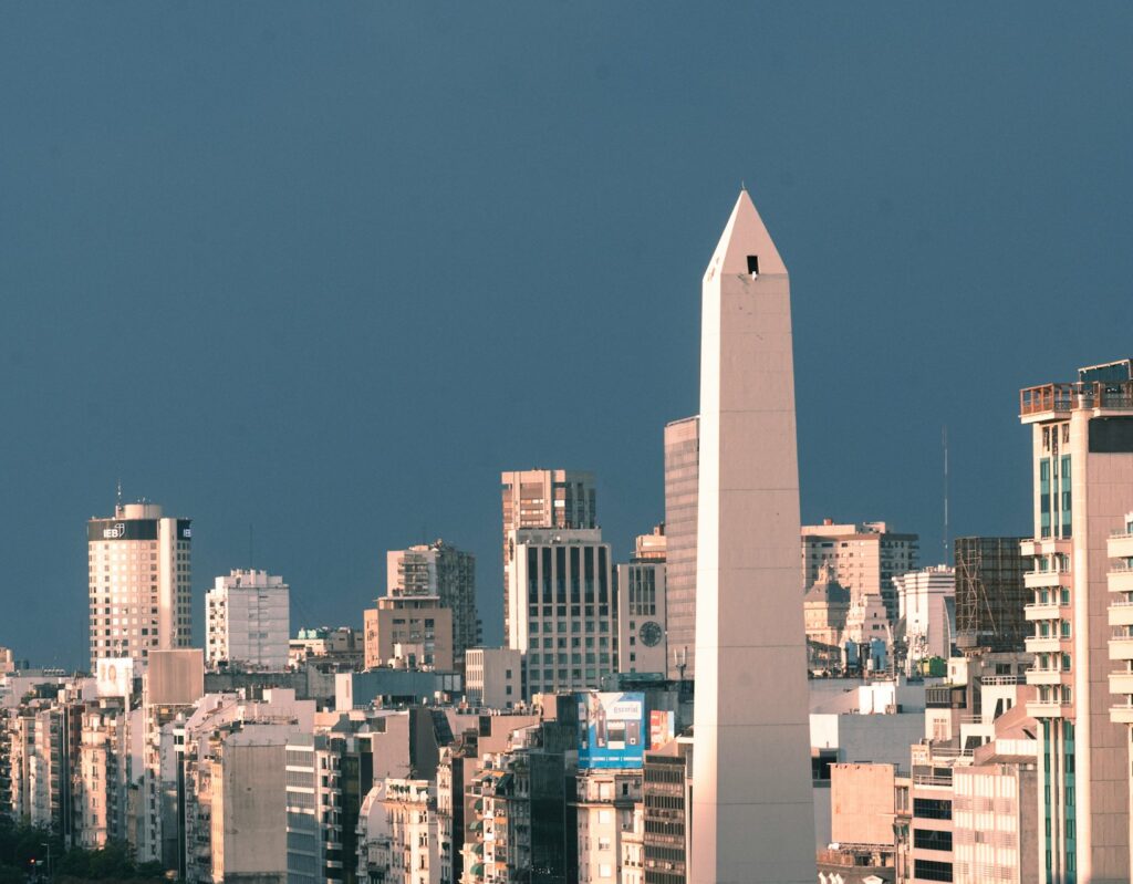 a very tall building in the middle of a city