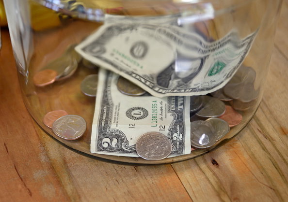 Money in a tip jar...