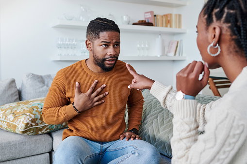 Shot of a young couple having an argument at home