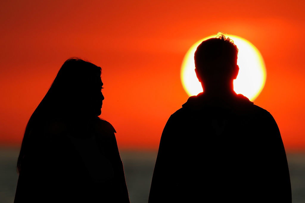 A couple seen along the Gulf of Finland's Pearl Beach during...