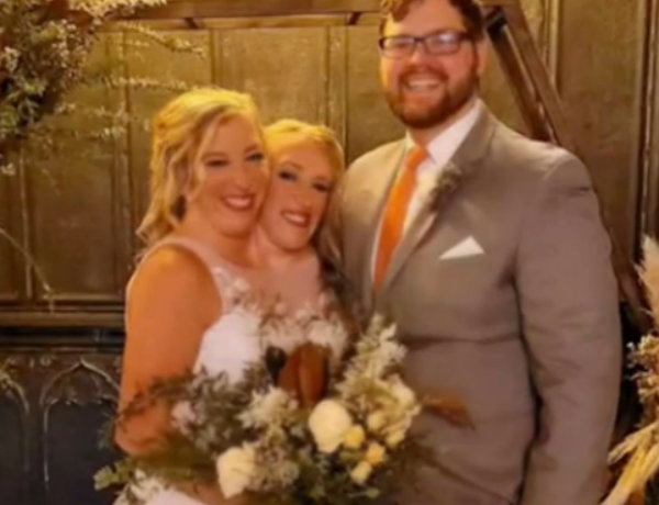 Abby and Brittany Hensel with husband