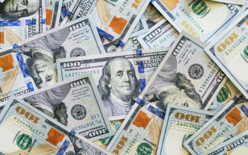 Dollar Bills (Unsplash | Giorgio Trovato)