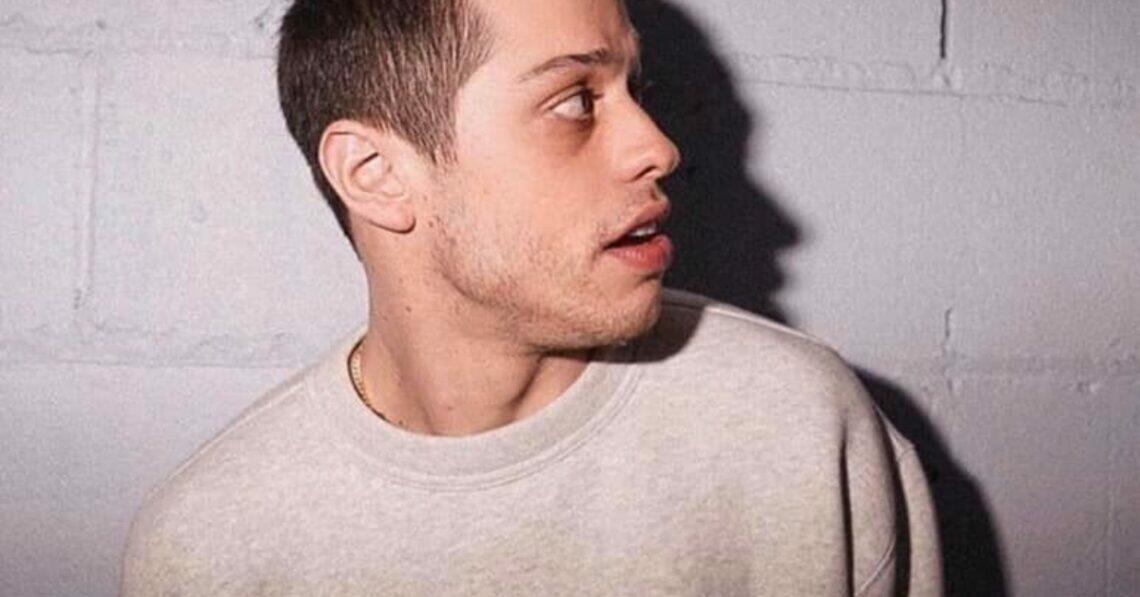 Pete Davidson looking to the side
