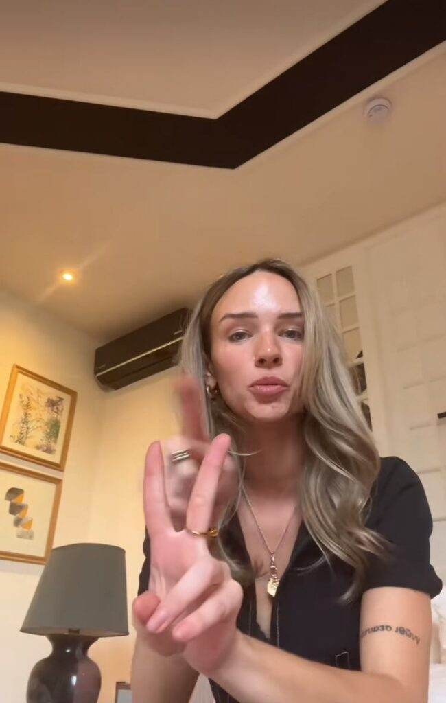 Abbey Humphreys explaining the reasons she dislikes rain showers (TikTok | abbey.freeze)