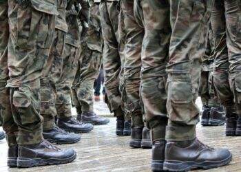 Group of military men standing next to each other