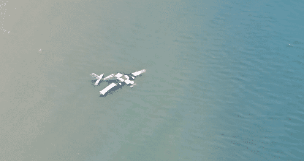 Plane in the water appears to be broken in two - Thailand police plane crash