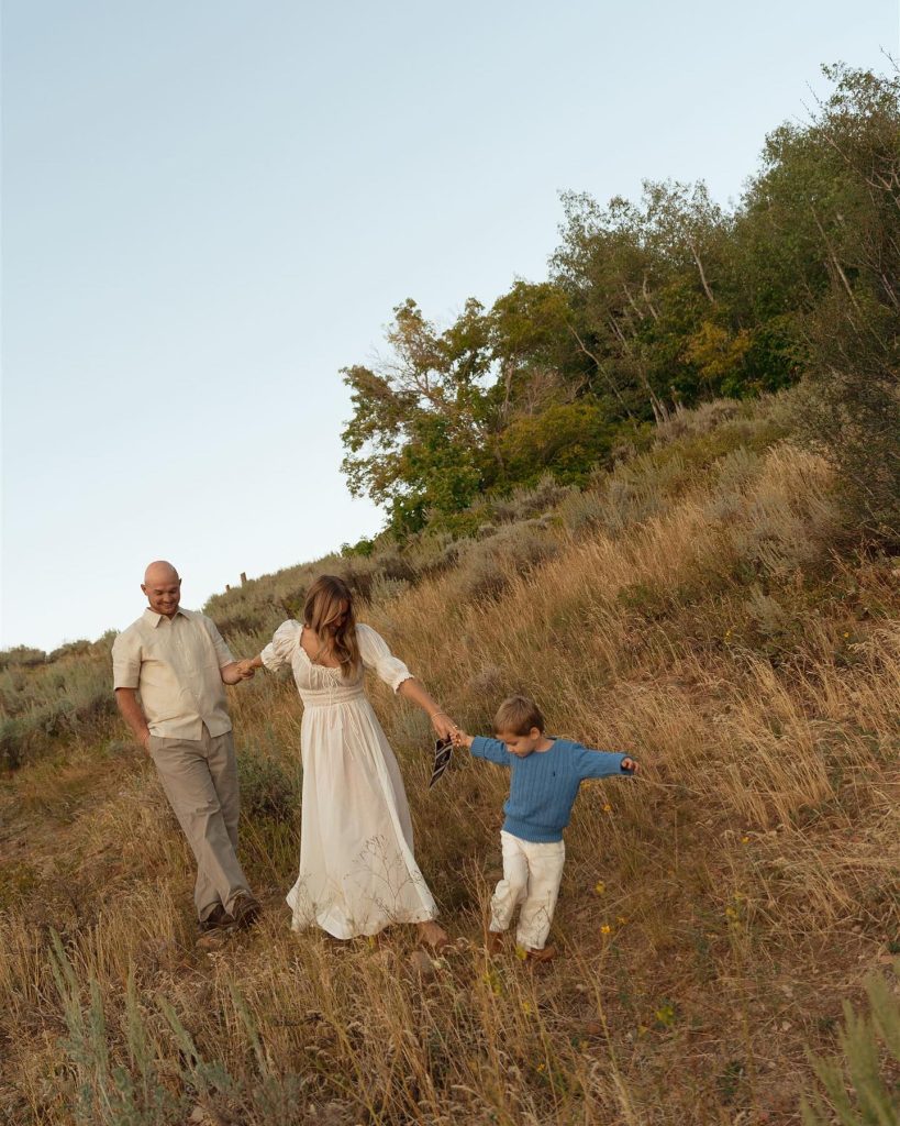 Emili Kiser with her husband and their son Trigg