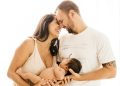 Parents holding baby