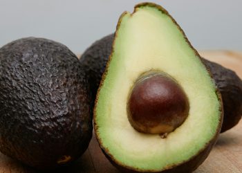 Ripe avocado open in half
