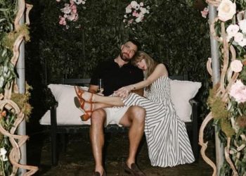 Taylor Swift and Travis Kelce engagement photo