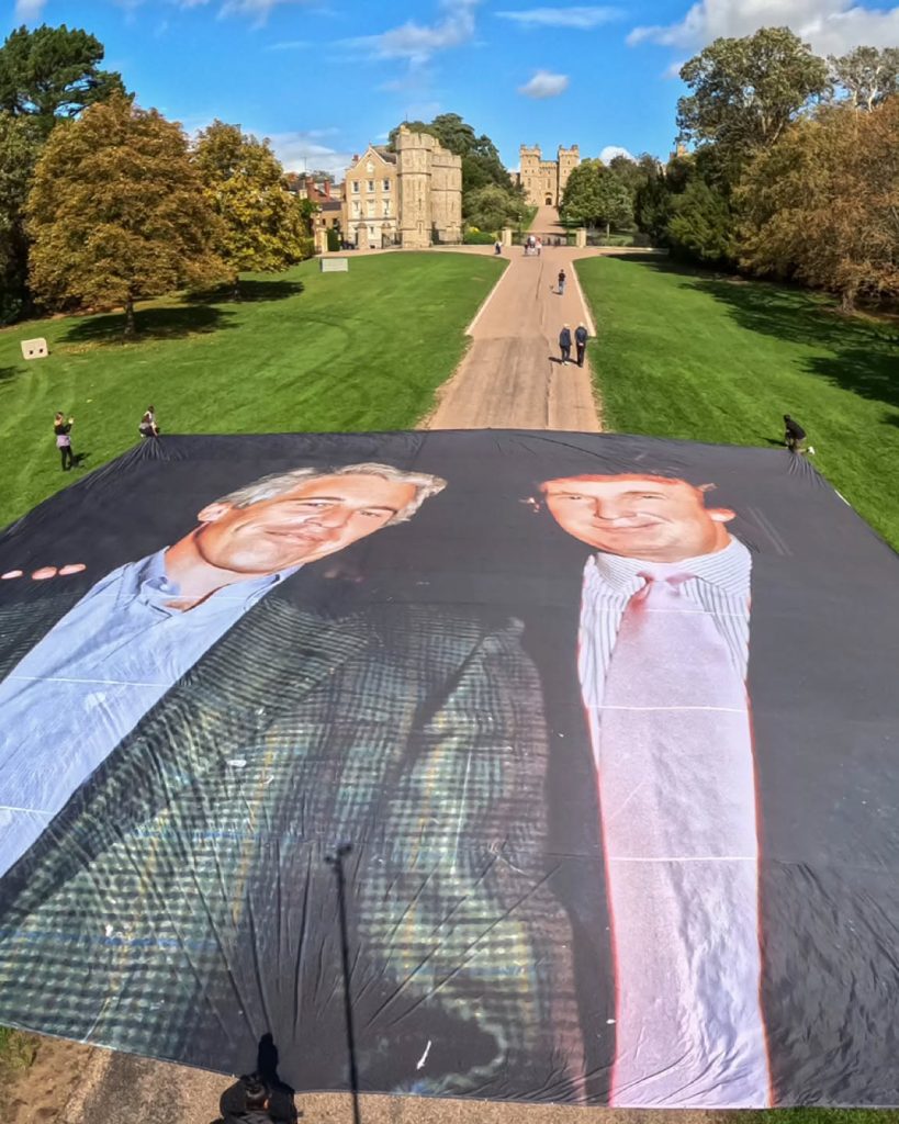 Banner on Windsor Castle footway showing Trump and Epstein