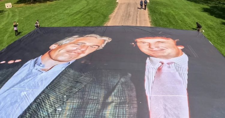 Banner on Windsor Castle footway showing Trump and Epstein