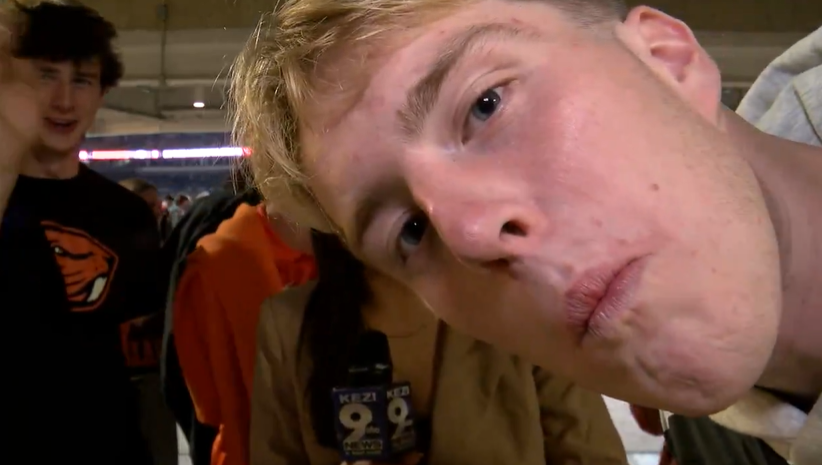 KEZI reporter being taunted by football fans