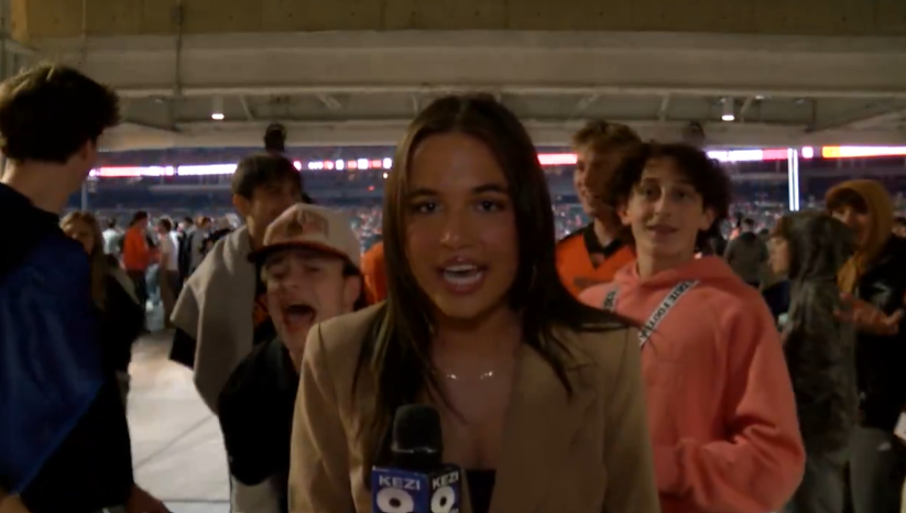 KEZI reporter being taunted by football fans