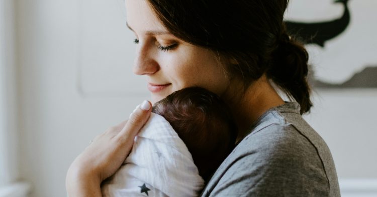 Mom holding baby