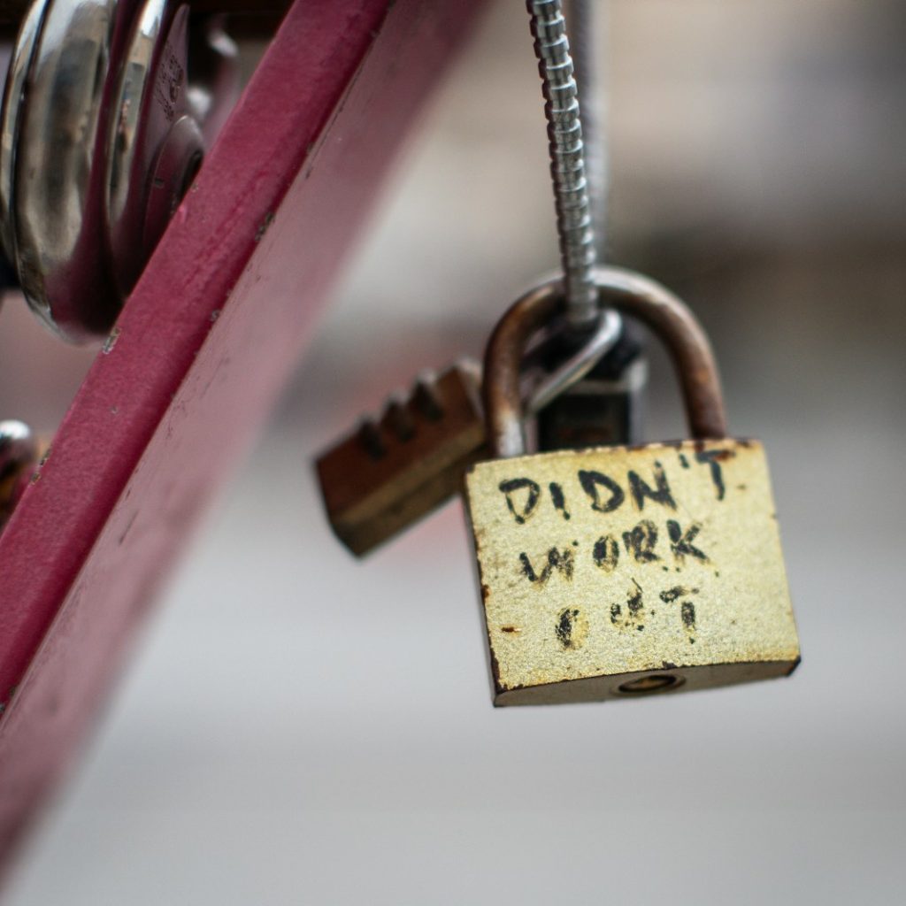 a padlock attached to a red bike with the words didn't work on